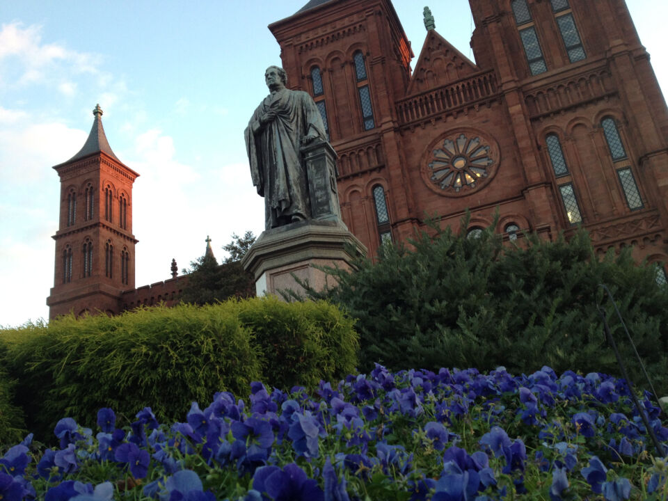 Garden and Statue outside of the Smithsonian Institute Castle